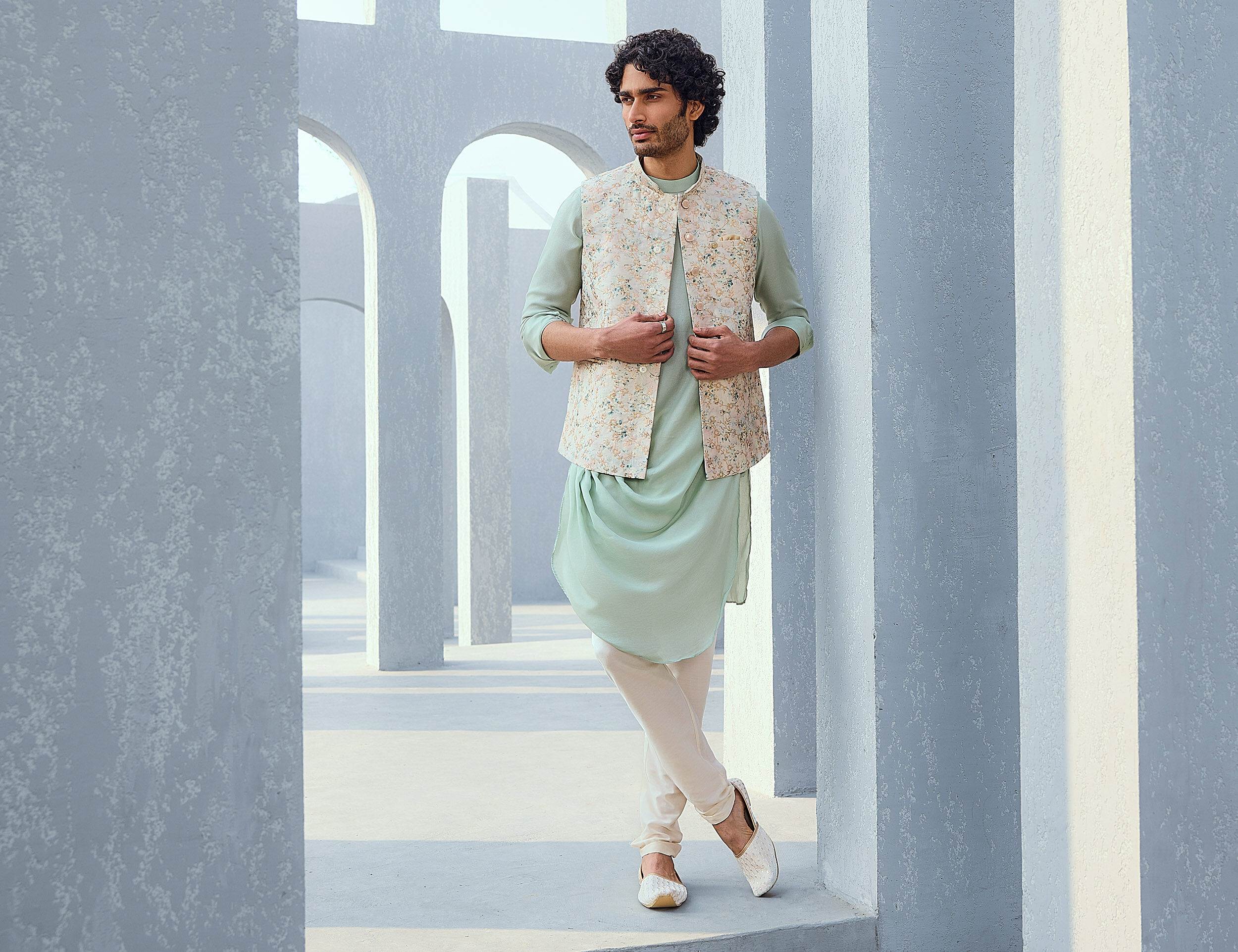 Boys wearing sky blue kurtas and white pants as stylish evening wedding outfits